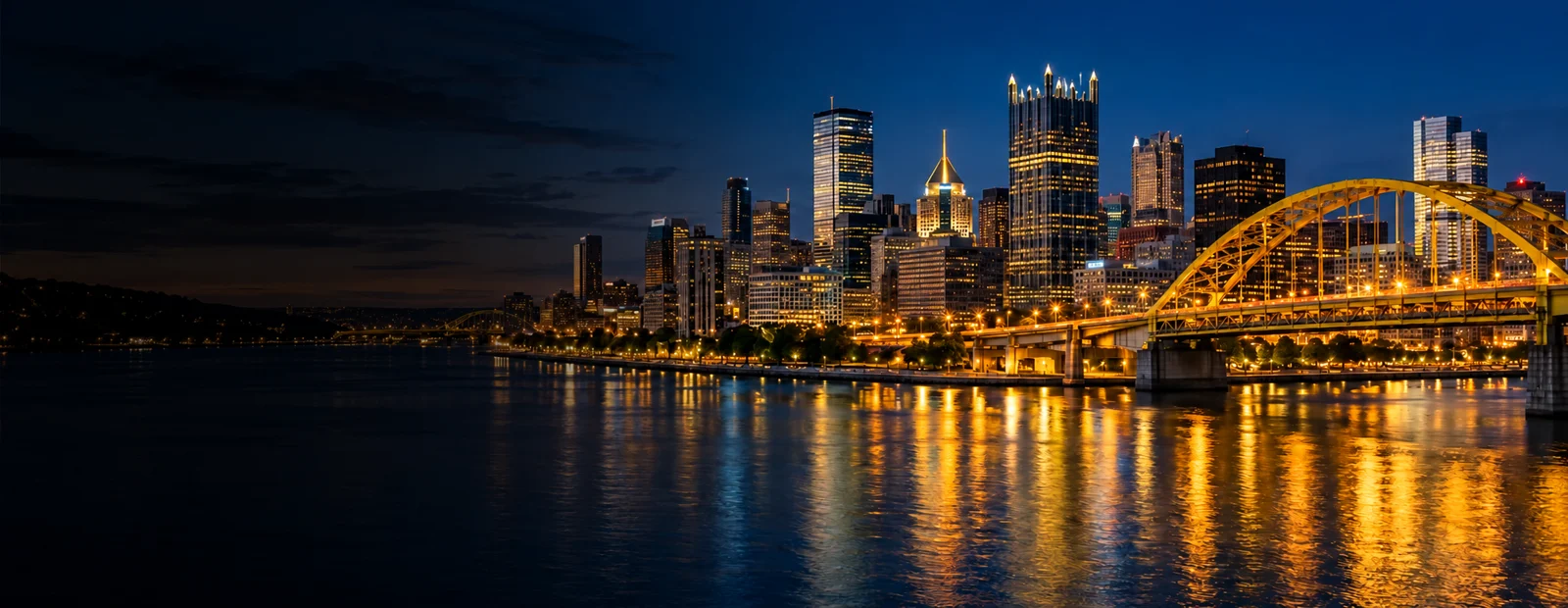 Illustrative Pittsburgh skyline and bridge at dusk